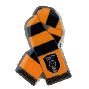 A scarf-shaped metal pin badge with black and orange stripes and a glasgow city fc logo on the orange section.